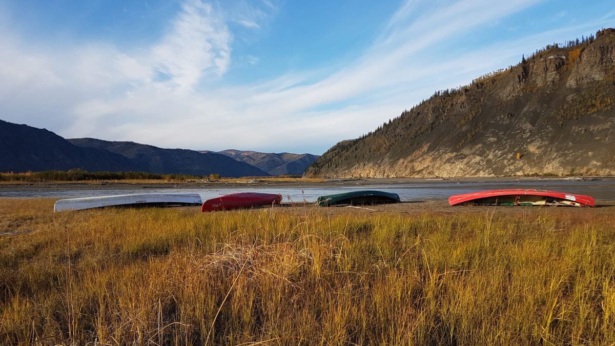 yukon-river-canoes-autumn-landscape